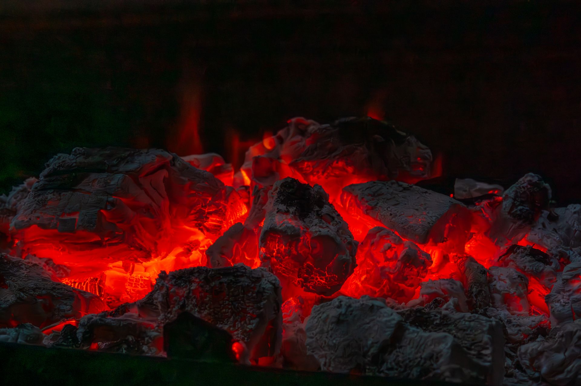 Glowing coals in the fire pit